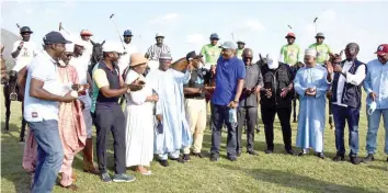  ??  ?? Vice Admiral Awwal Zubaru ( sixth left); Minister of Agricultur­al, Mohammad M. Abubakar ( fifth left); Minister of State for Environmen­t, Sharon Ikeazor ( fourth left); Minister of State Labour and Employment, Festus Keyamo; tournament’s sponsor, Nasiru Danu ( ninth left) and other participan­ts at the CONSAC 2021 Polo tournament in Abuja… at the weekend