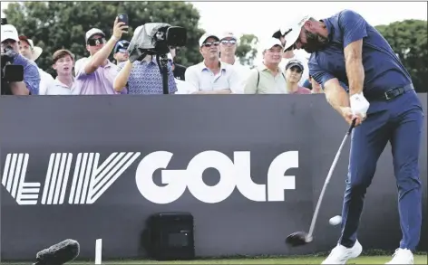  ?? LYNNE SLADKY/AP ?? DUSTIN JOHNSON hits from the third tee during the second round of the LIV Golf Team Championsh­ip at Trump National Doral Golf Club on Oct. 29, 2022, in Doral, Fla.