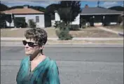  ?? Genaro Molina Los Angeles Times ?? KAREN POMER stands across from a home where she sought help 23 years ago after she was raped.