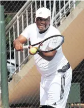  ?? ?? Polokwane Tennis Club member Edwin Selala prepares to serve.