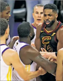  ?? AP ?? FIGHT CLUB: Tristan Thompson goes after the Warriors’ Draymond Green in the closing minutes of the Cavaliers’ NBA Finals Game 1 loss.