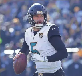  ?? CHARLES LECLAIRE/USA TODAY SPORTS ?? A week after throwing for 87 yards and one touchdown, the Jaguars’ Blake Bortles responded with a 214-yard, 1-TD game.