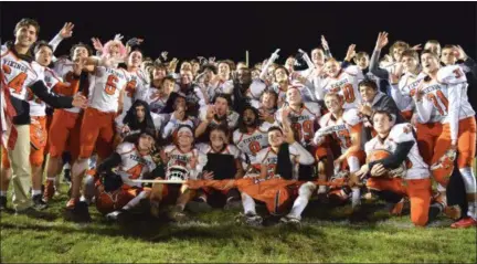  ?? AUSTIN HERTZOG - DIGITAL FIRST MEDIA ?? The Perkiomen Valley football team celebrates after winning its third straight PAC championsh­ip with a 35-17 win over Pottsgrove.