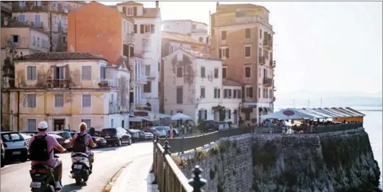  ?? CHEN YUEFEI / FOR CHINA DAILY ?? Chinese tourist Chen Yuefei visits the Greek island of Corfu to trace the steps of his favorite British author and naturalist, the late Gerald Durrell.