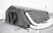  ?? Army Sgt. 1st Class Zach VanDyke / Associated Press ?? The 82nd Airborne Division erected large tents to provide accommodat­ions for up to 600 soldiers at Fort Bragg, N.C.