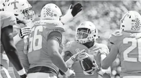  ??  ?? Tennessee running back Tim Jordan (9) celebrates a touchdown during the Tennessee Volunteers Orange & White spring game at Neyland Stadium in Knoxville, Tennessee on Saturday, April 21, 2018. CALVIN MATTHEIS/NEWS SENTINEL