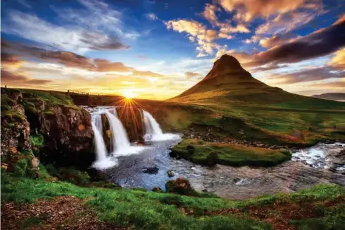  ?? (Getty/iStock) ?? A sunset over Kirkjufe ll mountain on the Snaefe ll snes Peninsu l a