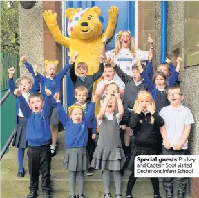  ??  ?? Special guests Pudsey and Captain Spot visited Dechmont Infant School