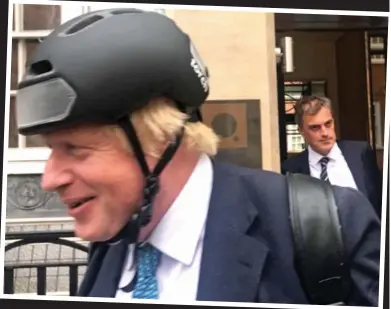  ??  ?? Grassroots favourite: Boris, with chief whip Julian Smith, after their lunch yesterday