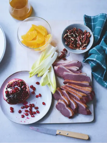  ??  ?? Above left: Bristol’s Lido restaurant favours wood and smoke. Above: a recipe for smoked duck from Charlotte Pike’s book Smoked