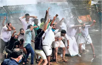  ??  ?? MUSLIM YOUTH League workers staging a protest near the Chief Minister’s residence in Thiruvanan­thapuram on June 18 against the government’s decision to allow only nonresiden­t Keralites with COVID-FREE medical certificat­es to board flights bound for Kerala.