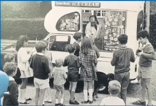  ??  ?? Giovanni in his new pride and joy, above, and, left, serving up a treat in Cambridge in his original ‘Batmobile’ van in the 1960s