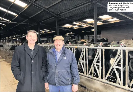  ??  ?? Speaking out Brian Whittle on a visit to Laigh Tarbeg Dairy Farm, pictured with farmer Hugh Watson