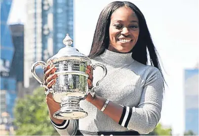  ?? Picture: Getty. ?? Sloane Stephens with the US Open trophy, which she won with a 6-3 6-0 win over friend Madison Keys.