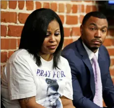  ??  ?? in this 2014 file photo, nailah Winkfield (left) and omari Sealey (right) the mother and uncle of Jahi McMath, listen to doctors speak during a news conference in San Francisco. AP PHOTO/erIC rIsberG