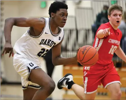  ?? PHOTOS BY GEORGE SPITERI — FOR MEDIANEWS GROUP ?? Dakota’s Michael Umeh leads a break during a MAC Red Division game against Chippewa Valley on Friday.