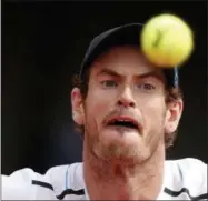  ?? CHRISTOPHE ENA — THE ASSOCIATED PRESS ?? Britain’s Andy Murray eyes the ball as he plays Argentina’s Juan Martin del Potro during their third round match of the French Open tennis tournament at the Roland Garros stadium, Saturday in Paris.