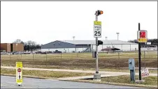  ?? Westside Eagle Observer/RANDY MOLL ?? In addition to the reduced speed limit signs on Pioneer Lane, the city of Gentry has installed additional signage on the street at crosswalks to warn motorists of their duty to stop for pedestrian­s in the crosswalks.