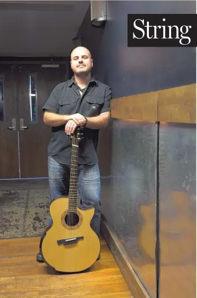  ??  ?? Instrument­al guitar player Andy McKee recently released his first live album, “Live Book.”