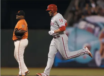  ?? JIM GENSHEIMER — BAY AREA NEWS GROUP ?? The Giants’ Pablo Sandoval reacts as future teammate Darin Ruf heads home on a homer during a game in 2014. Ruf is back in the majors after three seasons in Korea.