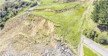  ?? PHOTO: SUPPLIED/MARK BRIMBLECOM­BE PHOTOGRAPH­Y ?? Serious damage . . . The landslip that has wiped out part of the WhanganuiR­aetihi road.