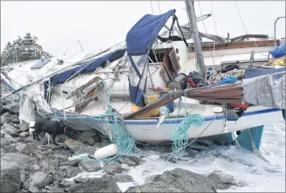  ?? CAPE BRETON POST PHOTO ?? The Liberty, an 11-metre sailboat, is shown stranded on the shores of Gabarus.