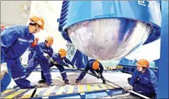  ?? LIN SHANCHUAN/XINHUA/CHINA DAILY ?? Technician­s install equipment at Fuqing nuclear power plant in Fujian province last year.