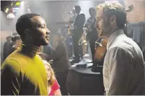  ?? ROBINETTE/LIONSGATE DALE ?? John Legend (left) as Keith and Ryan Gosling as Sebastian in a scene from the movie “La La Land” directed by Damien Chazelle.