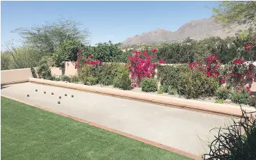  ?? JOHN VYBORNY / THE ASSOCIATED PRESS ?? A freshly completed bocce ball court at John Vyborny’s home in Tucson.