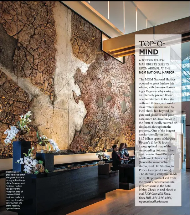  ??  ?? Breaking new ground: Local artist Margaret Boozer’s topographi­cal map of the Potomac and National Harbor hangs over the reception area of the new MGM National Harbor. It uses clay from the constructi­on site of the recently opened resort.