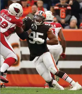  ?? (AP/Kirk Irwin) ?? Defensive end Myles Garrett (95) has 14 sacks for the Cleveland Browns this season, which ranks second in NFL behind T.J. Watt of the Pittsburgh Steelers, who has 16.