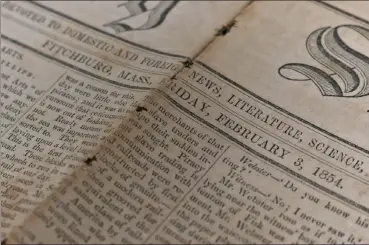  ?? ?? This edition of the Fitchburg Sentinel from Feb. 3, 1854 is seen on April 19, 2022. Founded in 1838, the Sentinel ran for more than a century before it combined with the Leominster Enterprise to become today’s Sentinel & Enterprise.