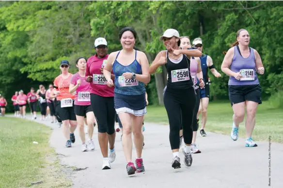  ??  ?? » Top and above The 2012 Toronto Women’s Half Marathon &amp; 5K