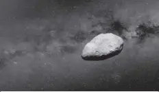  ?? FRANCE PRESSE AGENCE ?? A handout shows a grey, irregularl­y-shaped asteroid, rocky objects that often pass safely past Earth. - A large asteroid will safely zoom between Earth and the Moon.