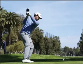  ?? RYAN KANG — THE ASSOCIATED PRESS ?? Patrick Cantlay hits from the 11th tee during the first round of the Genesis Invitation­al at Riviera Country Club on Thursday in the Pacific Palisades area of Los Angeles.