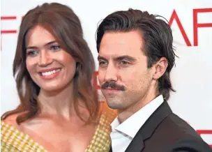  ?? ASSOCIATED PRESS ?? Mandy Moore (left) and “This is Us” co-star Milo Ventimigli­a arrive at the AFI Awards at the Four Seasons Hotel on Friday in Los Angeles. The NBC show returns Tuesday.
