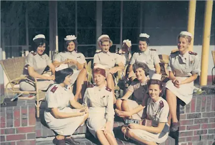  ?? PICTURE: SUPPLIED ?? Penelope Holmes, seated on the far right in the front row, with other midwives who trained in District Six during 1963.