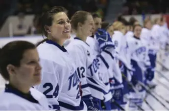  ?? RICHARD LAUTENS/TORONTO STAR ?? Natalie Spooner, second from left, will lead Team White into action at the CWHL all-star game on Saturday.