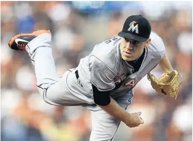  ?? BEN MARGOT/AP ?? David Phelps had a 3.45 ERA in 44 games with the Marlins this season. The team is getting four prospects back in Thursday’s deal.