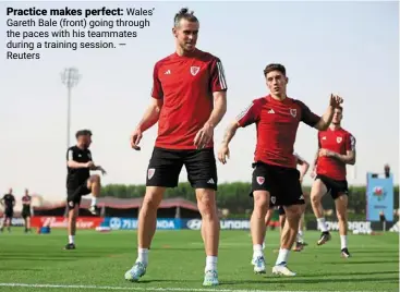  ?? — reuters ?? Practice makes perfect: Wales’ Gareth bale (front) going through the paces with his teammates during a training session.