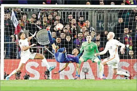  ?? AFP ?? Barcelona midfielder Pierre-Emerick Aubameyang scissor kicks the ball during the UEFA Europa League round of 16 first leg football match against Galatasara­y last week.