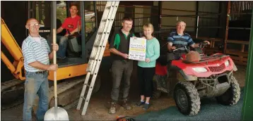  ??  ?? Making final preparatio­ns for the farm safety and mental health open day on Leslie Dixon’s farm, Moneylawn, were Mervyn Jones, Richard Jones, George Graham, Lisa O’ Donnell and Leslie Dixon.