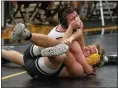  ?? BARRY BOOHER — FOR THE NEWS-HERALD ?? Tommy Jackson of Perry completes a five-point move against Riverside’s Ethan Bartlett in the 220-pound match of the Pirates’ 36-35win over the Beavers on Jan. 9.