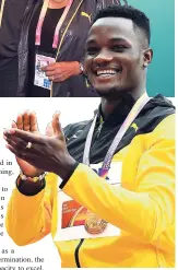  ??  ?? Jamaica’s World 110-metre hurdles champion, Omar McLeod, with his gold medal.