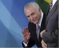  ?? ERALDO PERES/THE ASSOCIATED PRESS ?? Brazil President Michel Temer is auctioning off dozens of state assets in a new privatizat­ion program.