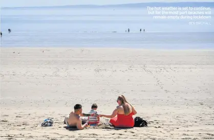  ?? BEN BIRCHALL ?? The hot weather is set to continue, but for the most part beaches will remain empty during lockdown