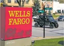  ?? ASSOCIATED PRESS FILE PHOTO ?? A sign for a branch of Wells Fargo bank in Deadwood, S.D., in September. Employees at a Wells Fargo location in Albuquerqu­e have voted to unionize, the first time workers at a major U.S. bank have attempted to organize.