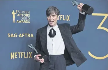  ?? PICTURE: ROBYN BECK/AFP/GETTY IMAGES) ?? Cillian Murphy holds his Screen Actors Guild best actor award aloft