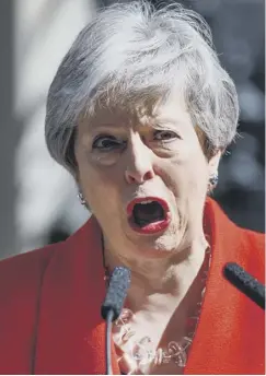  ??  ?? 0 An emotional Theresa May announces she is to step down