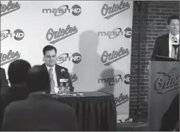  ?? Tribune News Service ?? Louis Angelos, right, announces contract extensions through 2018 for Baltimore Orioles Executive Vice President of Baseball Operation Dan Duquette, middle, and manager Buck Showalter, left.